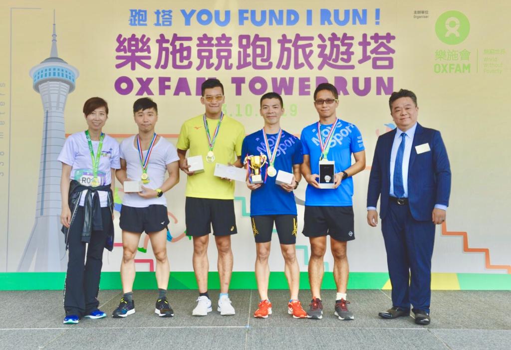 (左至右) 四人一隊的「隊際接力競跑」由澳門綜合運動協會以7分15秒跑畢全程，勇奪冠軍。