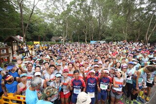 A total of 5,200 walkers are undertaking the 100 km challenge and will trek along the MacLehose Trail and other trails in teams of four within 48 hours.