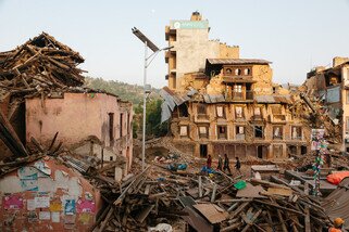 Badly damaged roads and infrastructure have made relief efforts difficult. (Photo:  Aubrey Wade/ Oxfam)