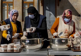 3 women packing food